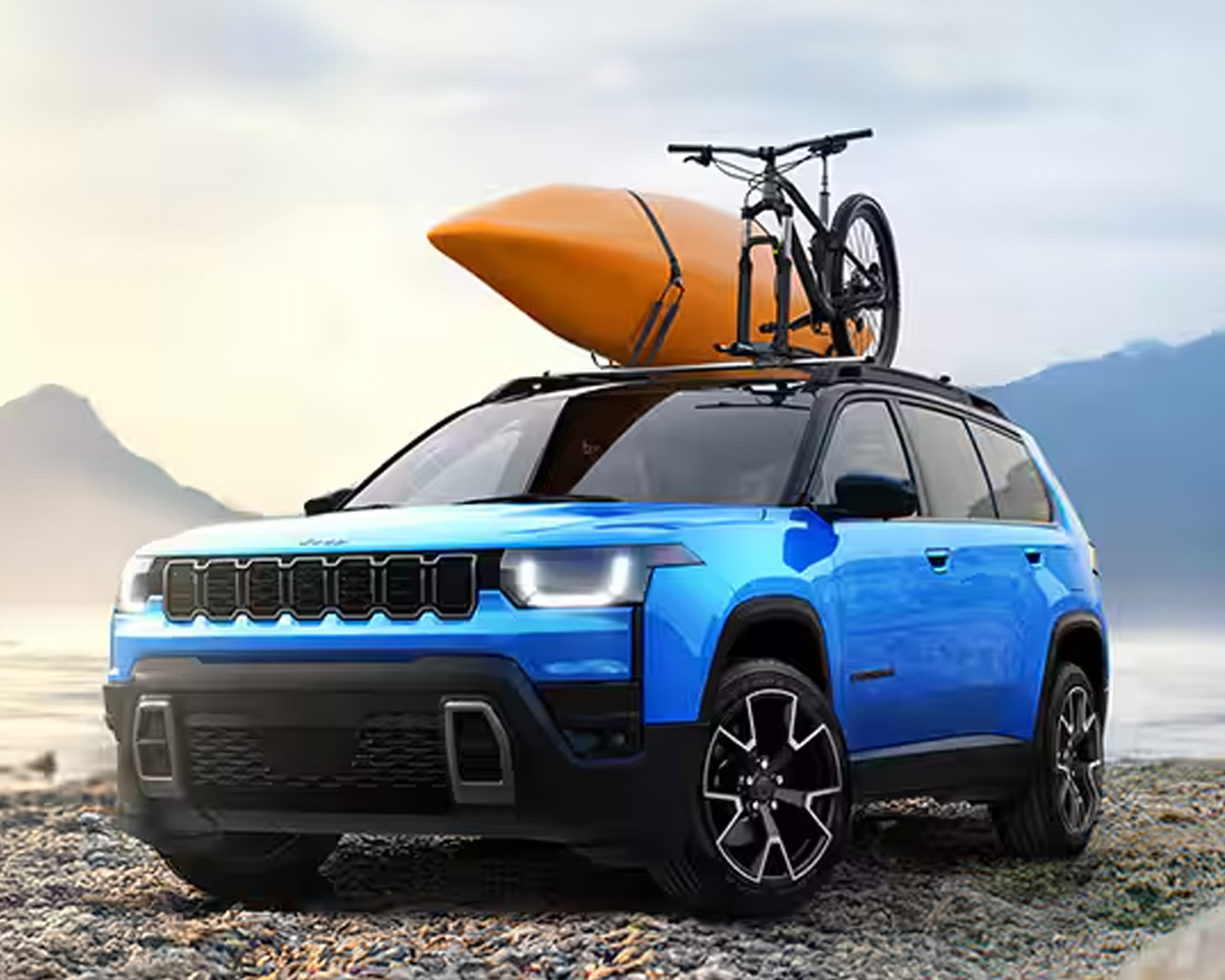 Cherokee parked on a beach.