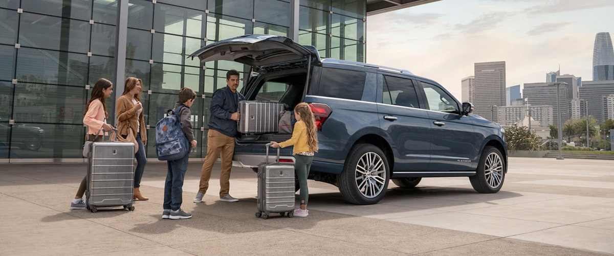 Family packing their 2023 EXPEDITION with suitcases