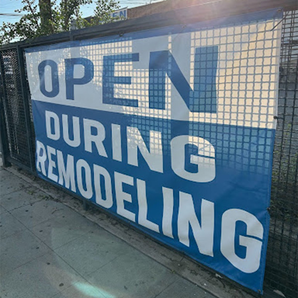 Open during remodeling sign
