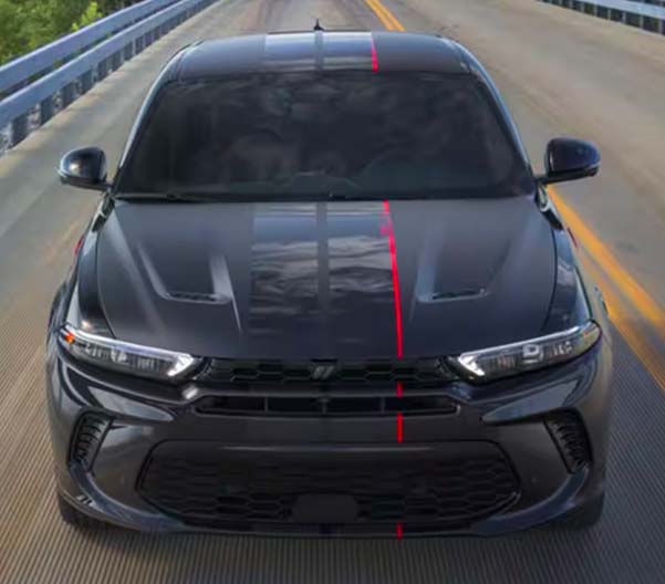 Rear view of a 2023 Dodge Hornet in action
