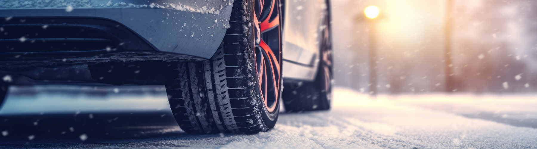 Winter tires on a frosty and snowy road.