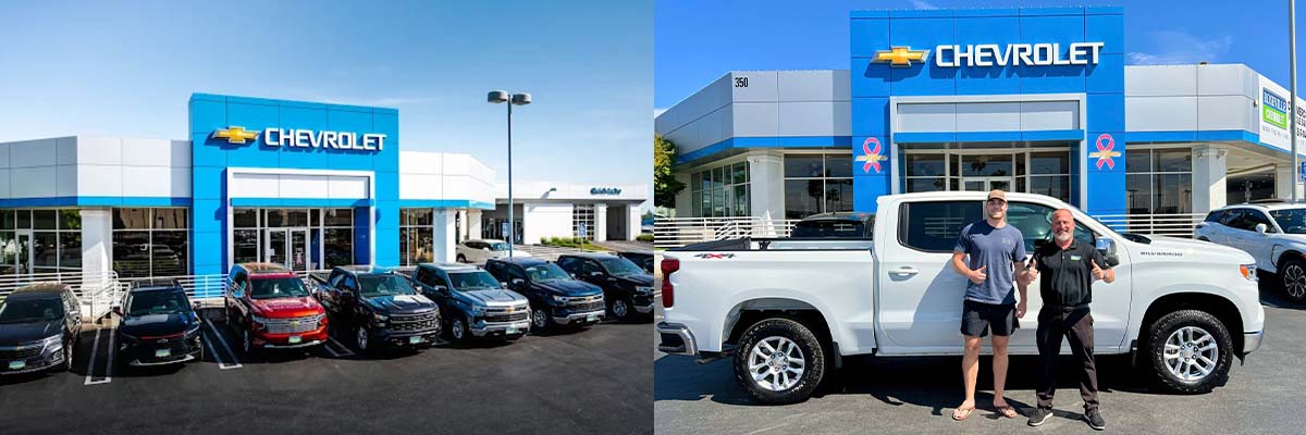 Dealership employee showing customers cars on showroom floor.