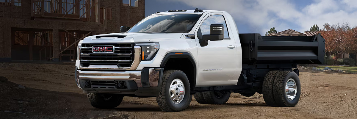 GMC truck parked on a work site