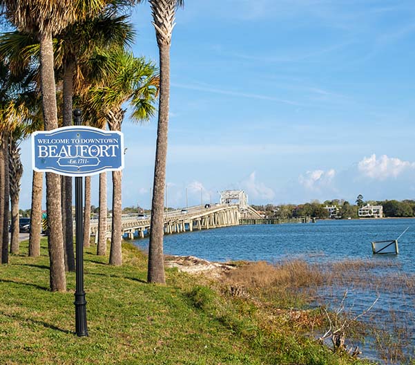 Scenic imagery of Beaufort SC with water and a bridge in the background